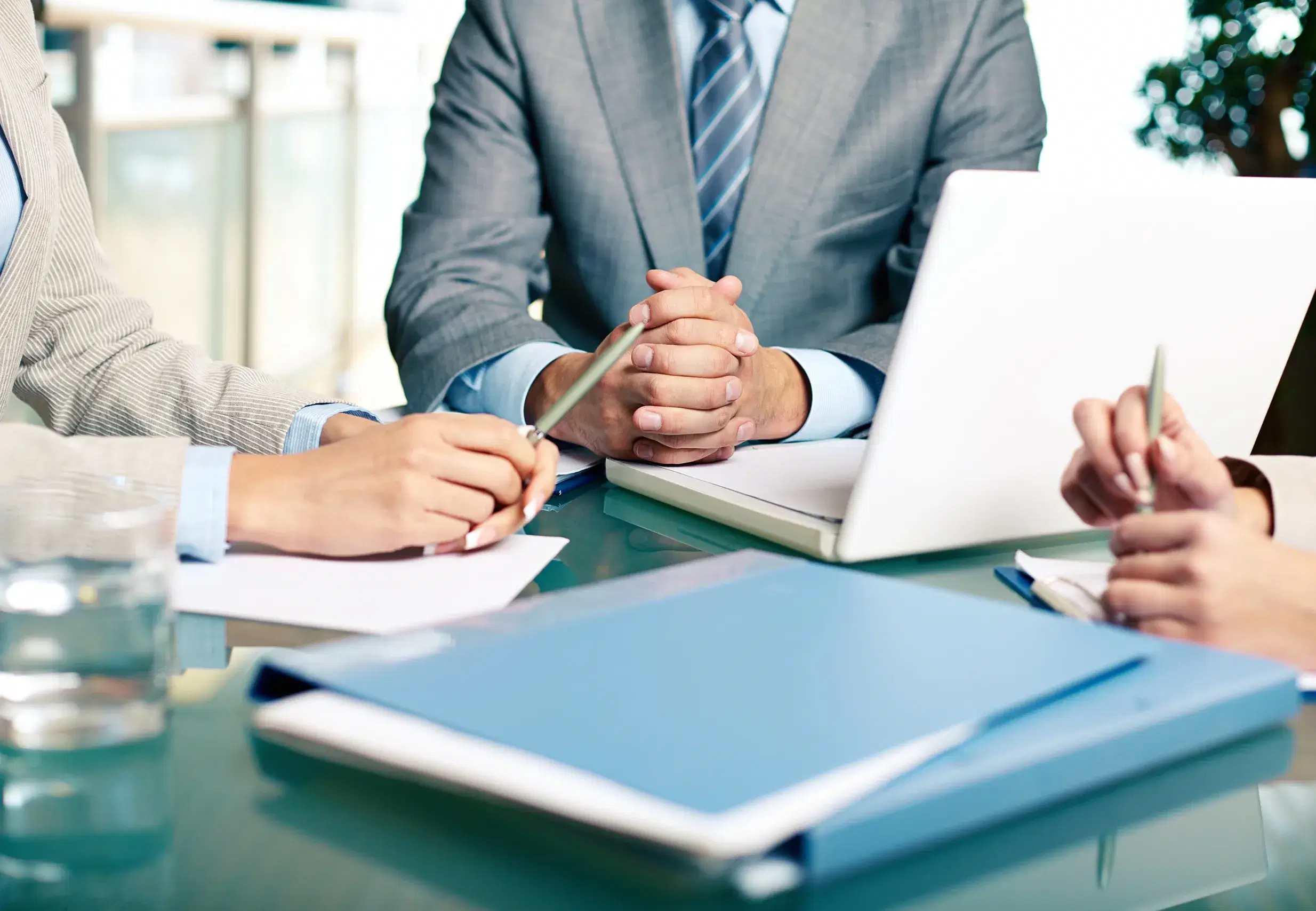 close-up-executives-sitting-table copy